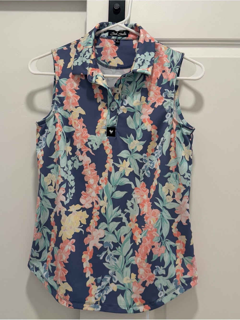 Women’s Bad Birdie Golf Polo Sleeveless |Floral with Coral and Mint Accents